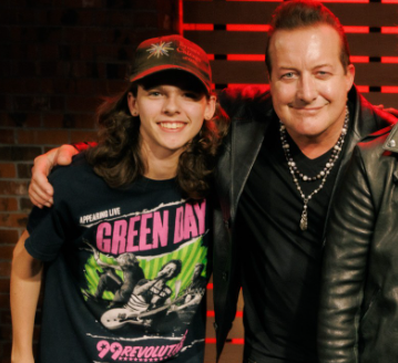 a picture of me next to Tre Cool>
                </div>
                <div class=